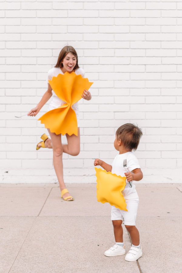 Two people dressed as pasta