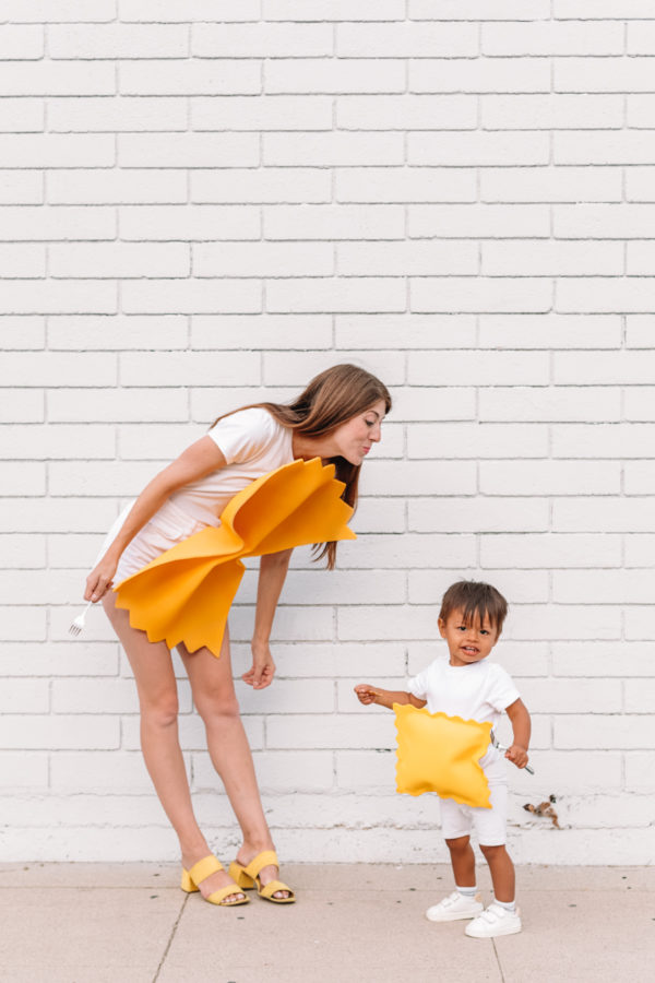 A woman and a child dressed as pasta