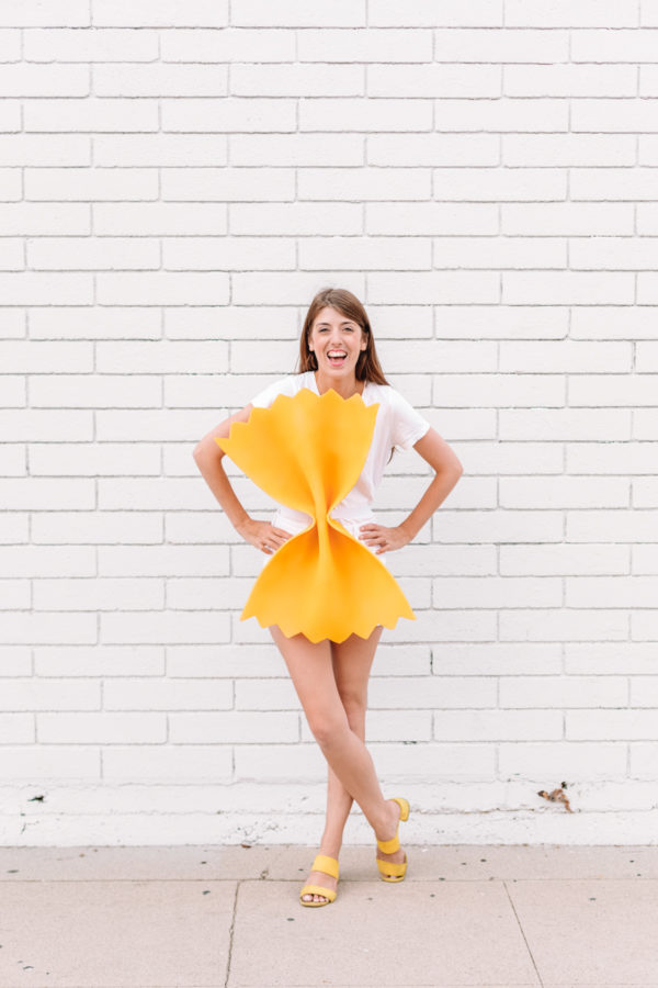 A woman posing for a picture dressed up as a pasta