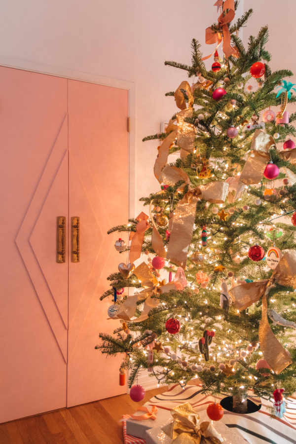 A Christmas tree with lights and decor