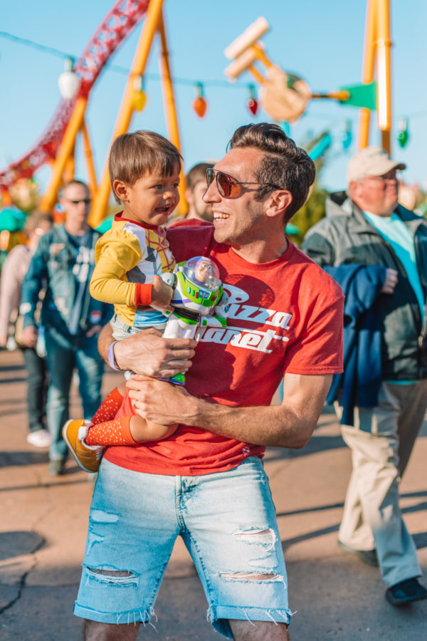 A man holding a little boy