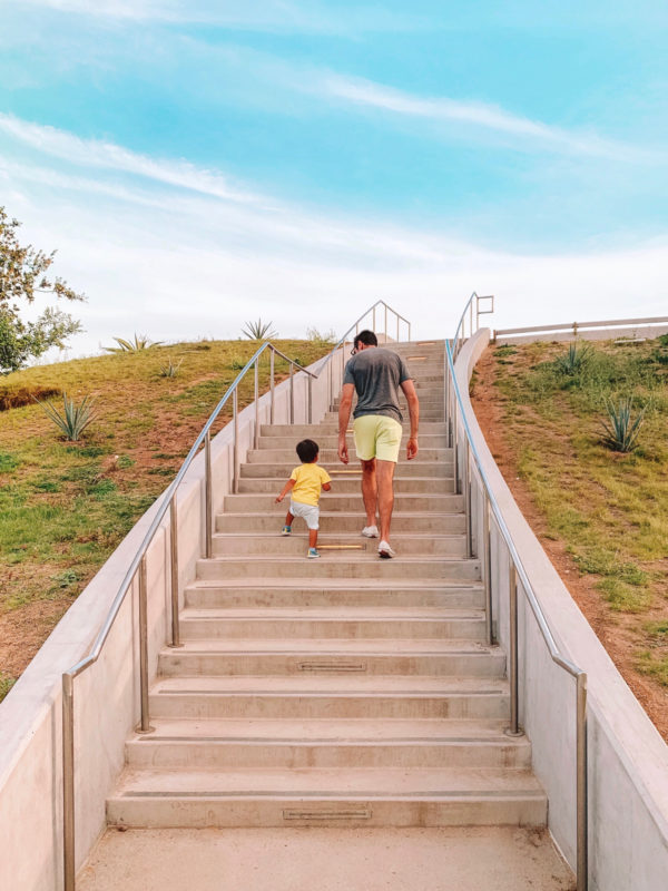 A man walking up the stairs