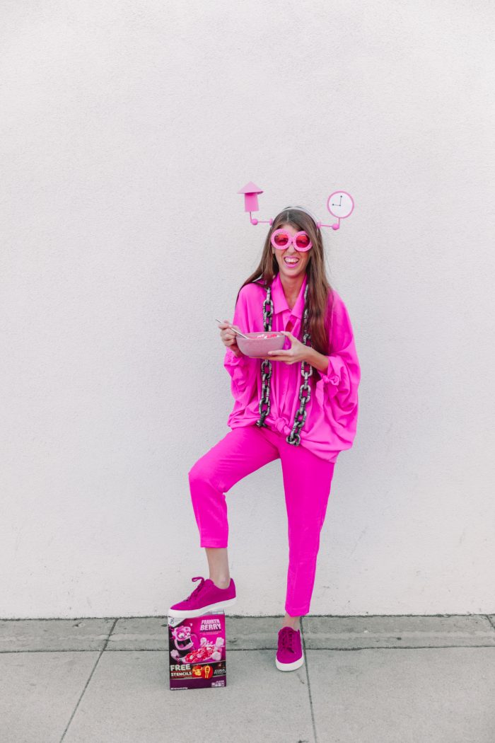 A girl in a pink costume