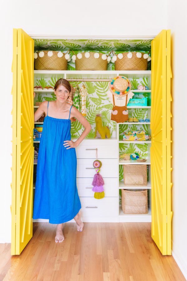 A woman standing in a closet