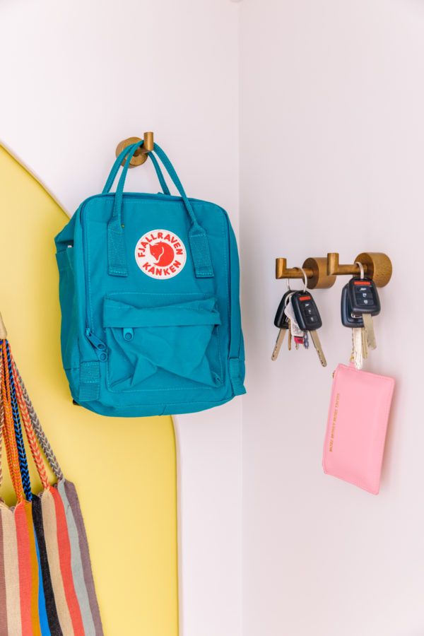 A blue backpack hanging