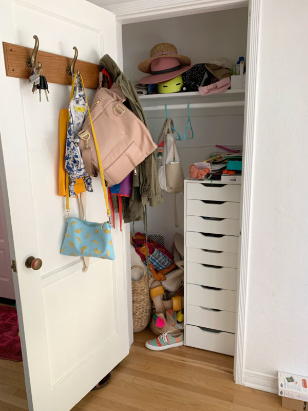 https://studiodiy.com/wp-content/uploads/2019/10/colorful-entry-closet-makeover-before-600x800.jpg