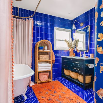 A bathroom with blue tiles