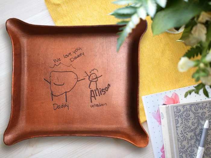 leather catch all with drawing on it
