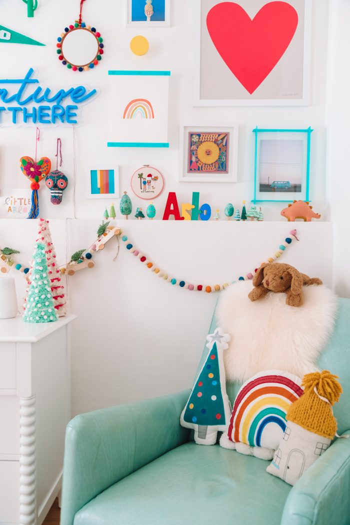 A bedroom with toys and art
