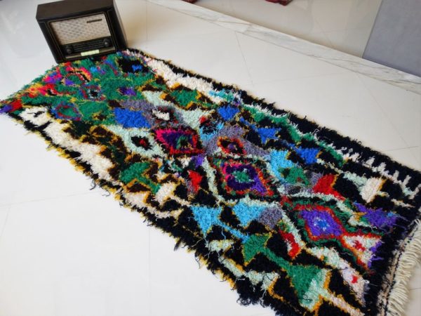 black and colorful small moroccan rug