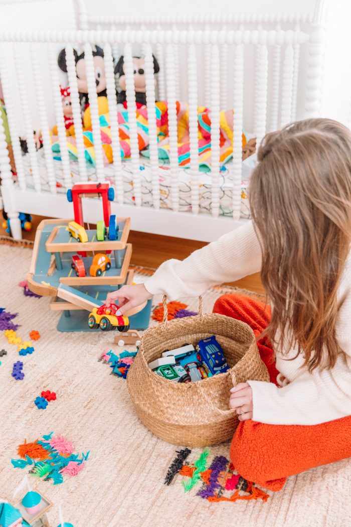 A woman playing with toys