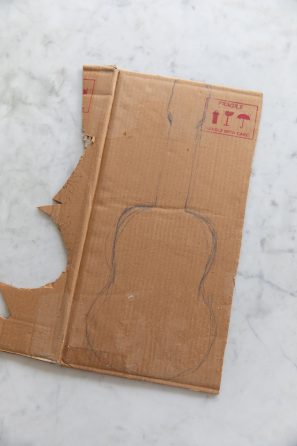 Cardboard with guitar drawing