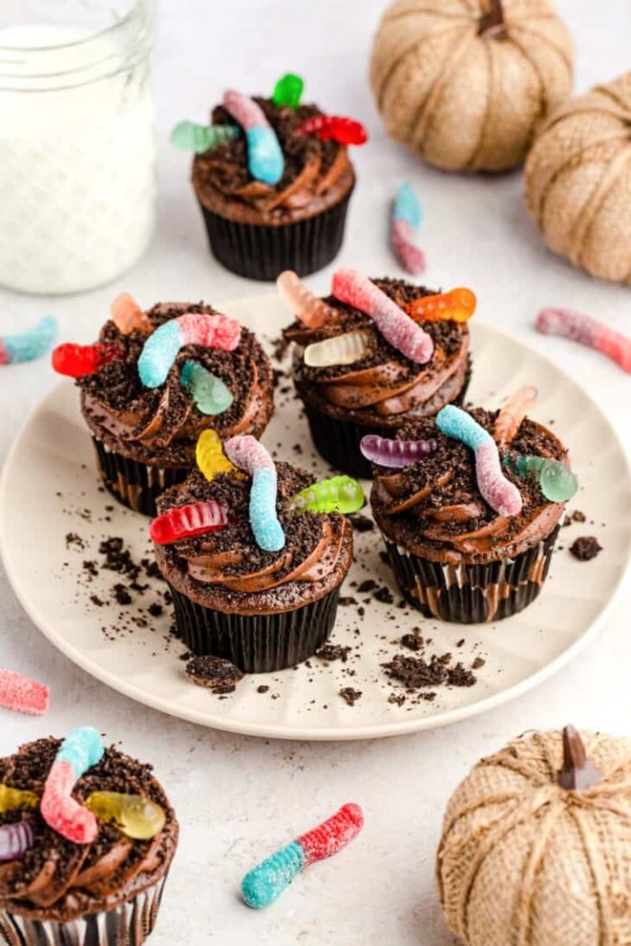 Halloween dirt cupcakes on a plate.