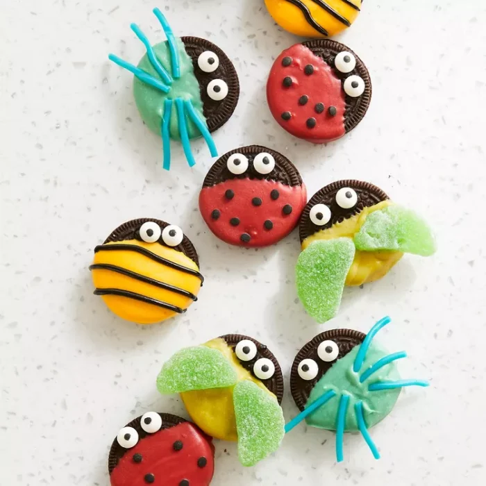 Bug decorated cookies on a counter.