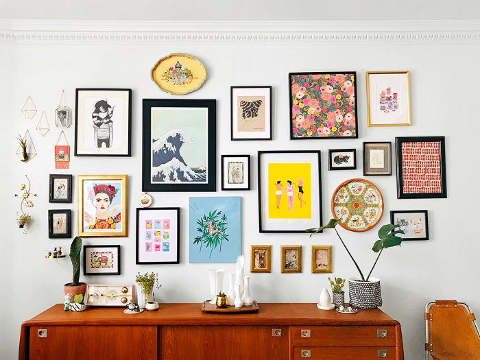 gallery wall above credenza