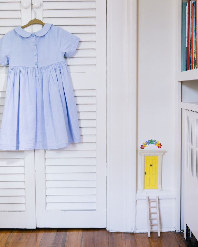 Closet doors with a hanging dress