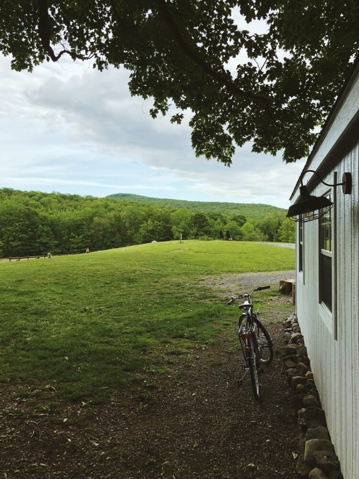 A bicycle parked in front of a house