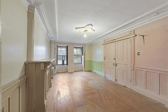 A room with a wooden floor