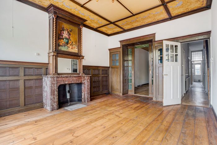 A living room with a fireplace