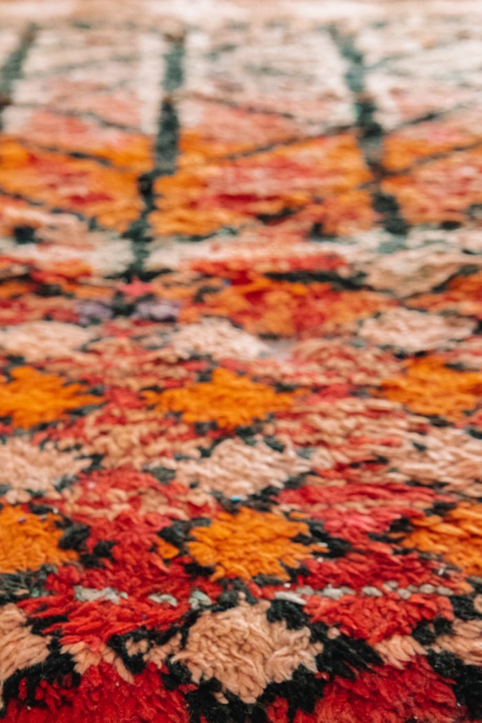 A close up of a colorful rug