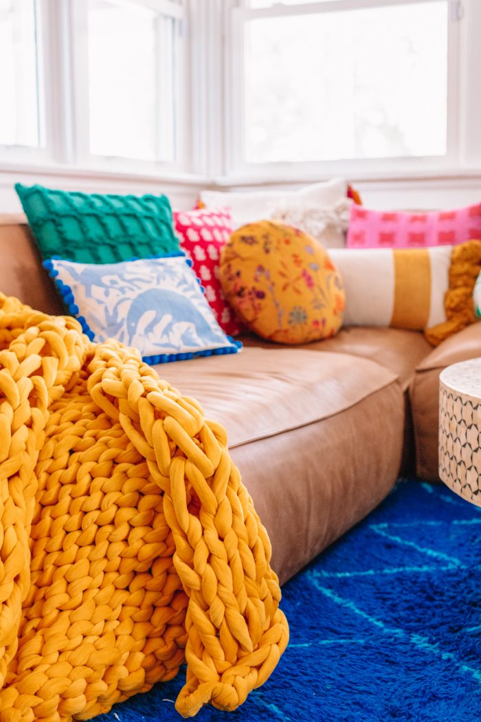 Leather Couch with Colorful Pillows