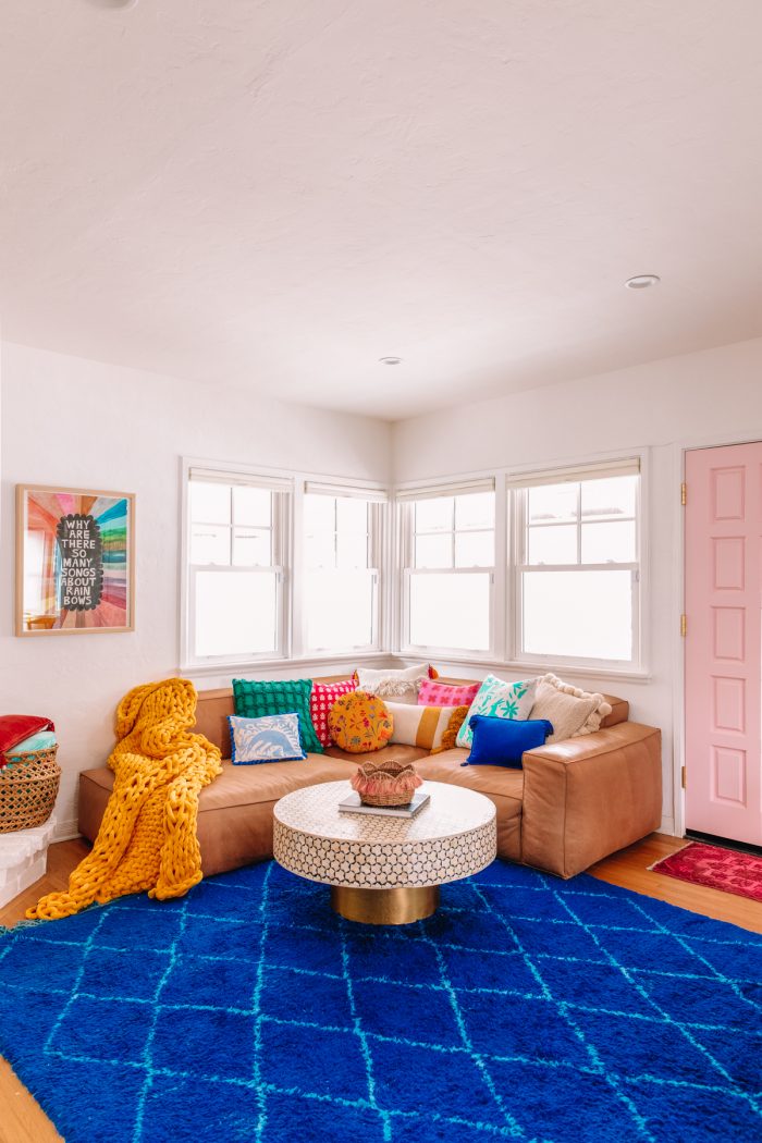 Colorful Living Room with a Leather Couch