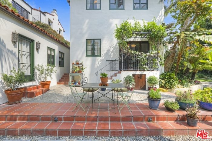 A backyard with a small table 