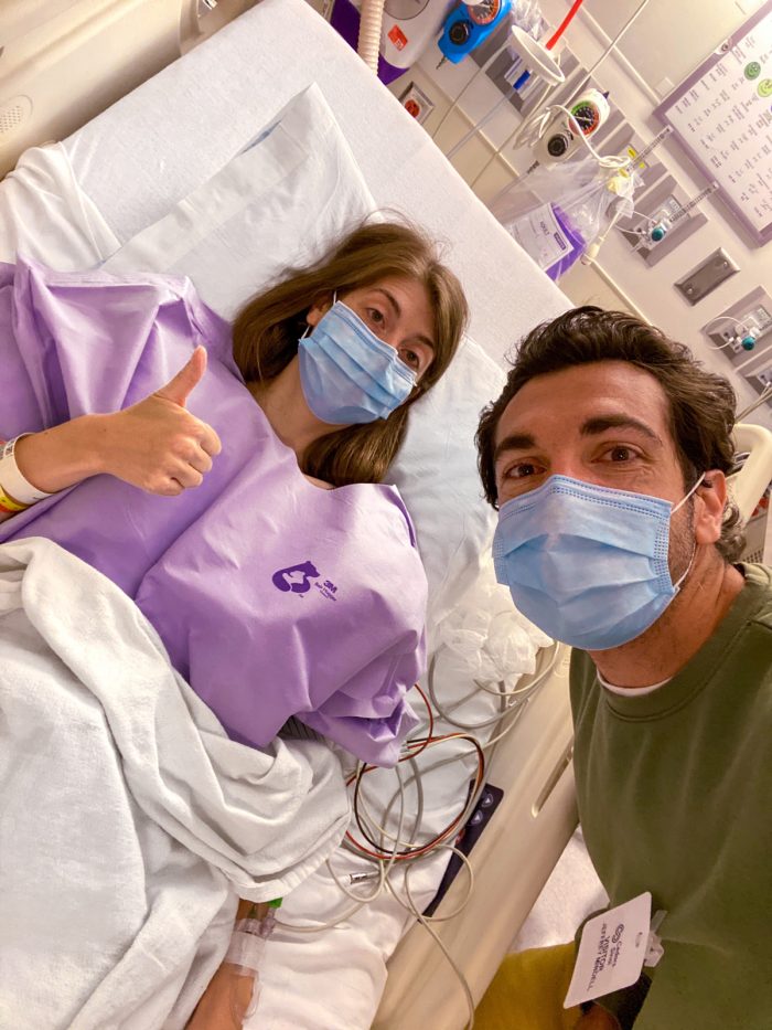 Two people in a hospital room