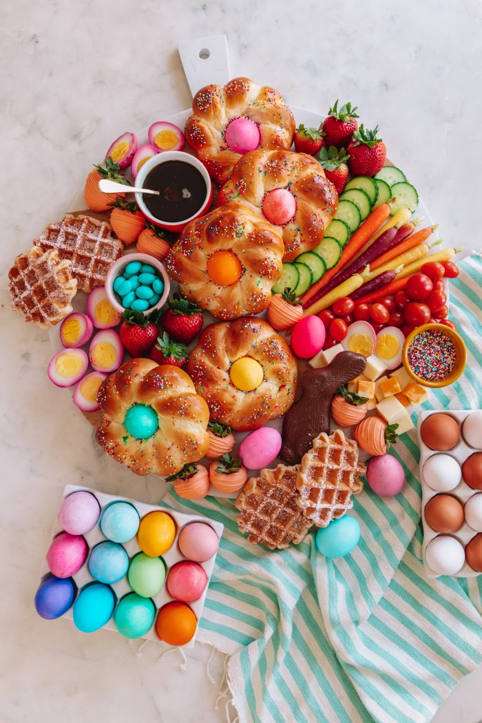 A pile of fruit and sweets sitting on a table