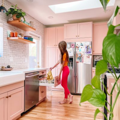 A person standing in a kitchen