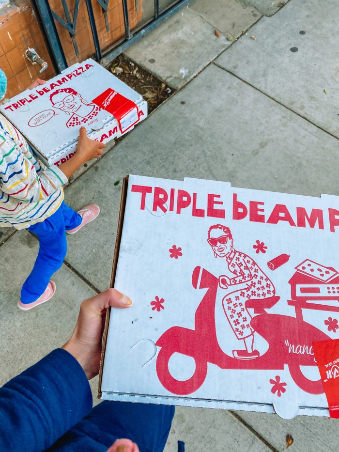 Triple Beam Pizza Boxes being carried in Los Angeles