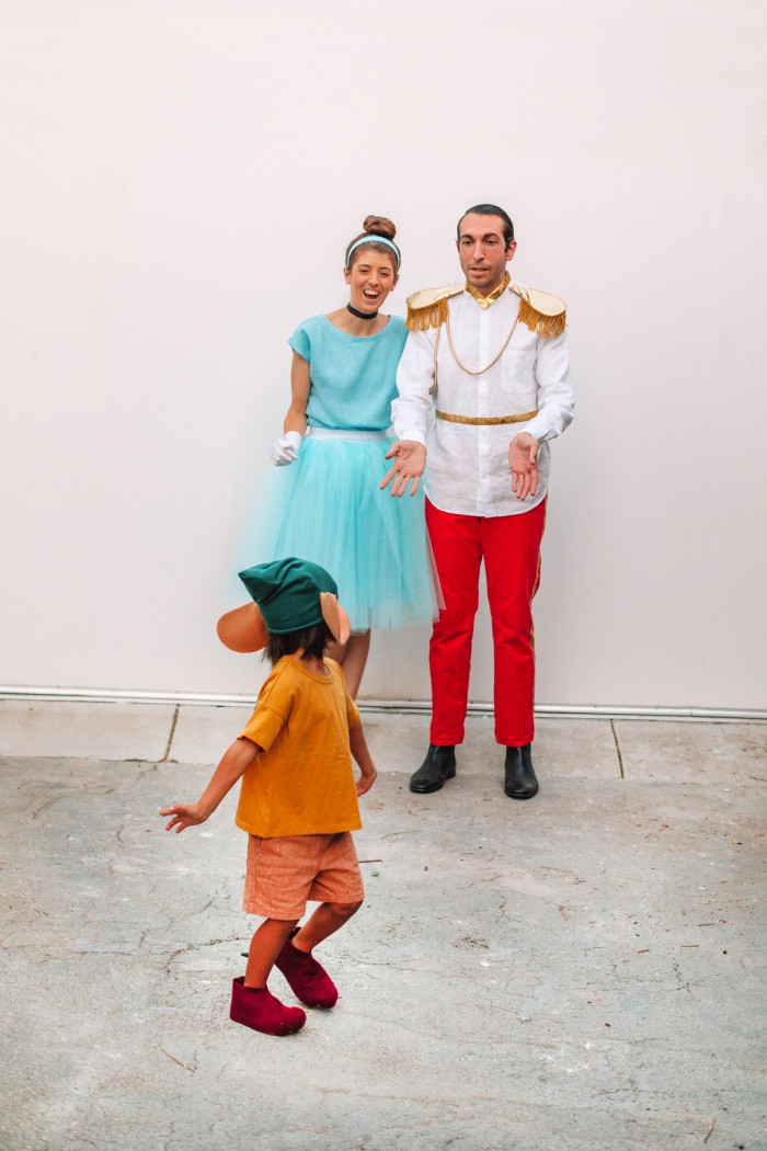 Cinderella Family Costume with Gus Gus in front of a white wall