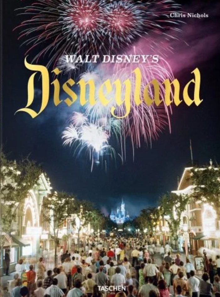 Cover for "Walt Disney's Disneyland" with an image of Disneyland at night