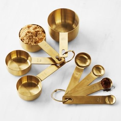 Beautiful gold measuring spoons and cups.