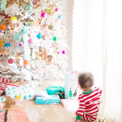 Baby looking at Christmas tree