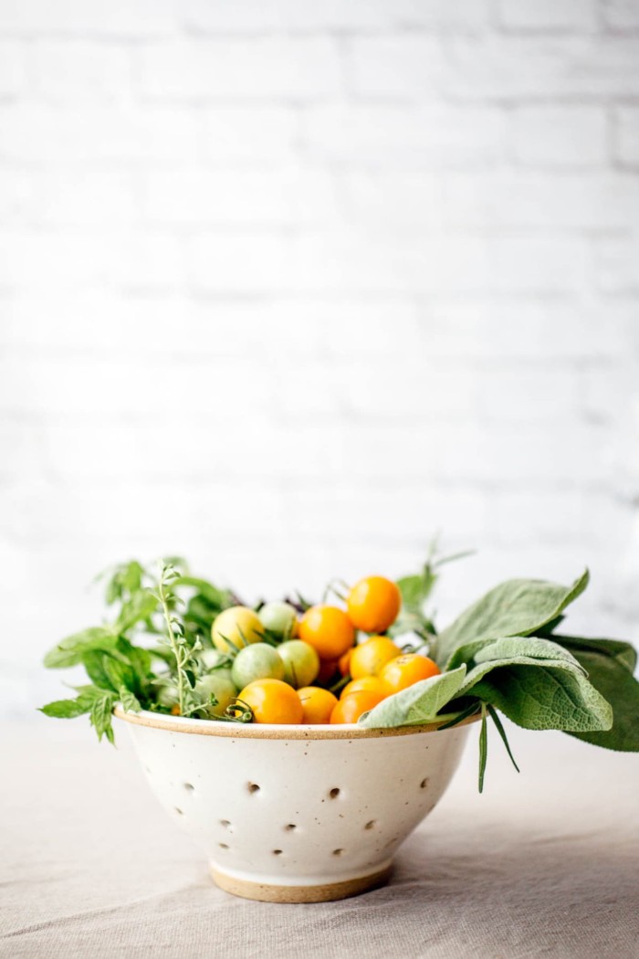 ceramic berry bowl filled with fruit