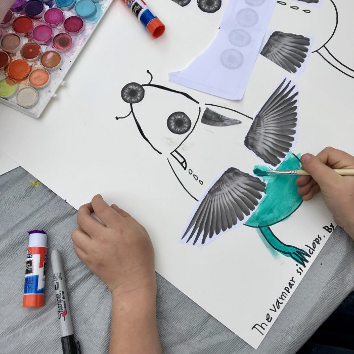 Picture of a kids illustration with glue stick and child's hand