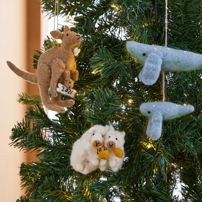 mom and baby animal ornaments on tree