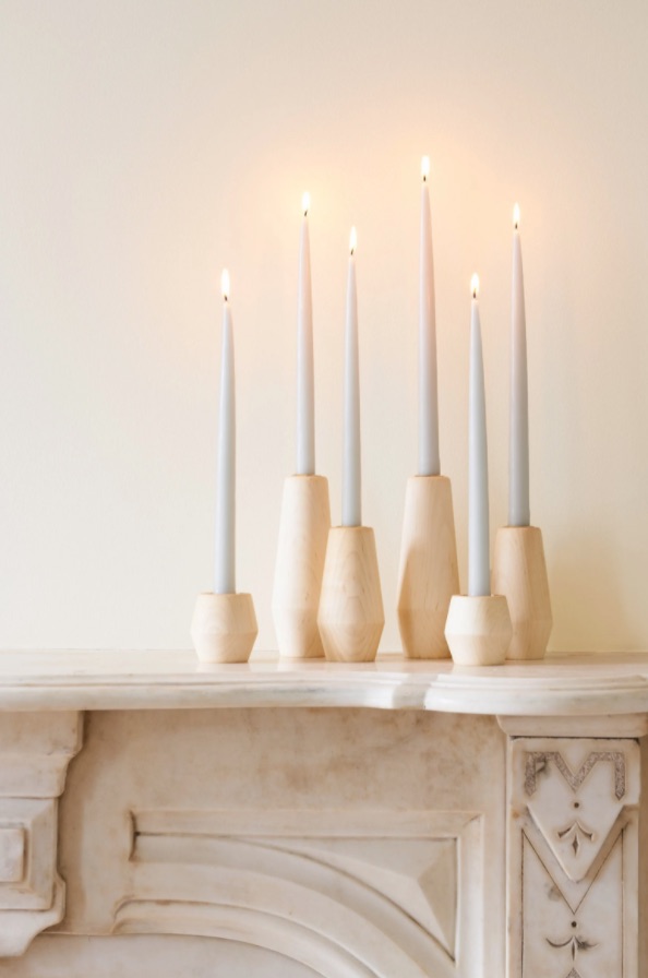 Wood taper candle holder with candles in use