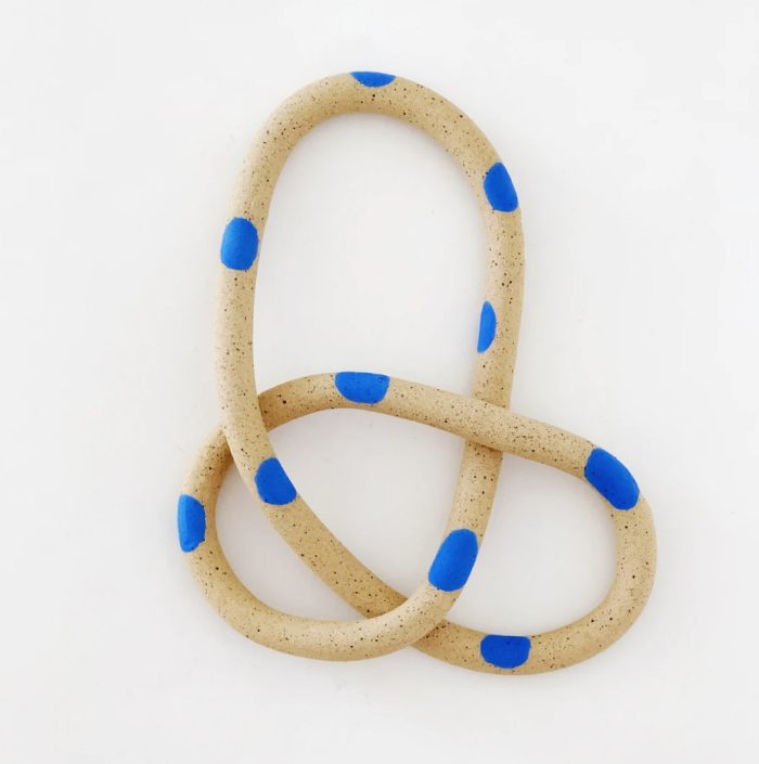 Clay rings with blue dots 