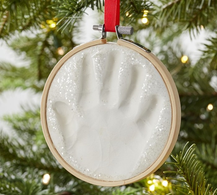 Handprint ornament hanging on tree