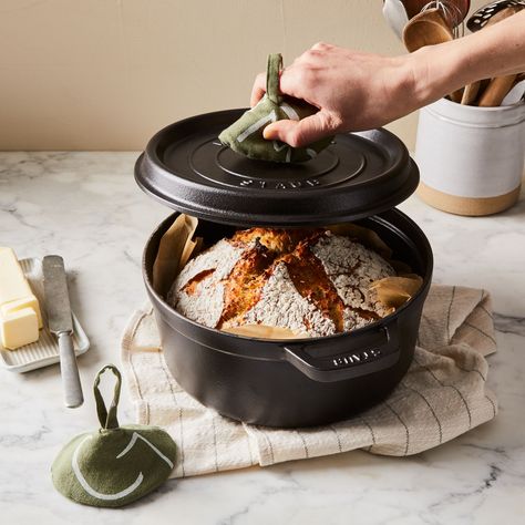 Cotton pot holders used to help handle hot pots while serving dinner.