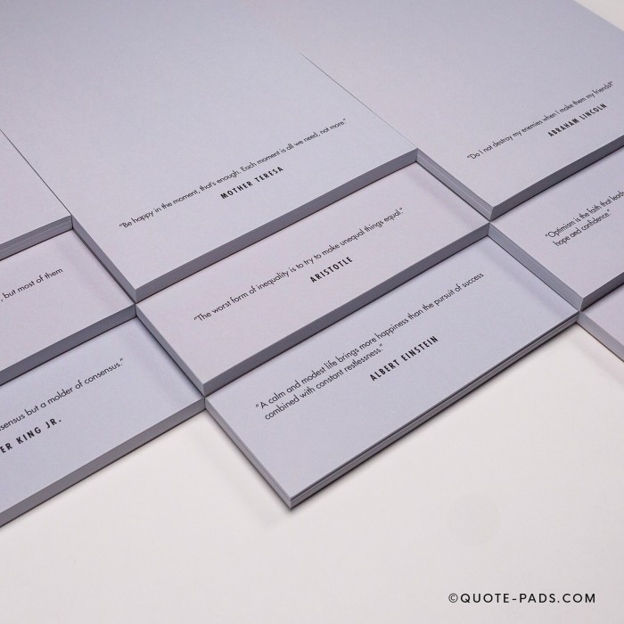 notepads with quotes from famous historical figures