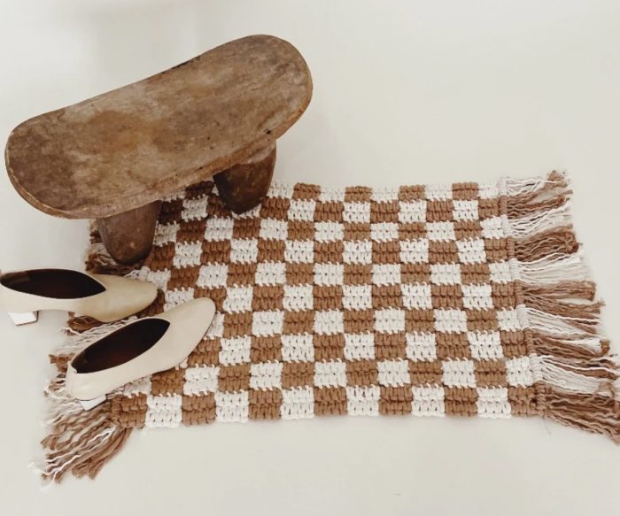 Brown and white checkered rug