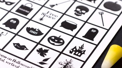 halloween bingo card on black background with candy corn