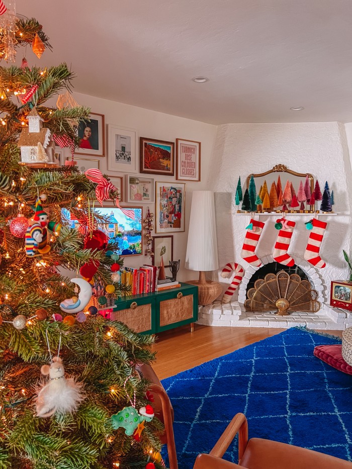living room with stockings and tree