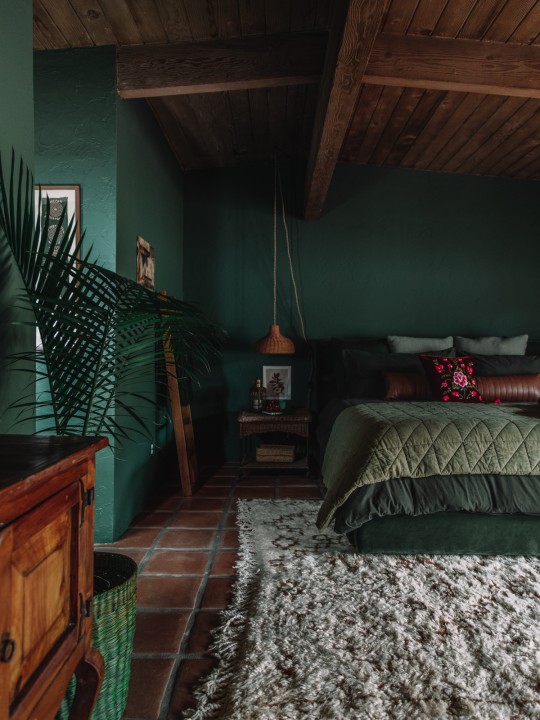 A Monochromatic Dark Green Bedroom