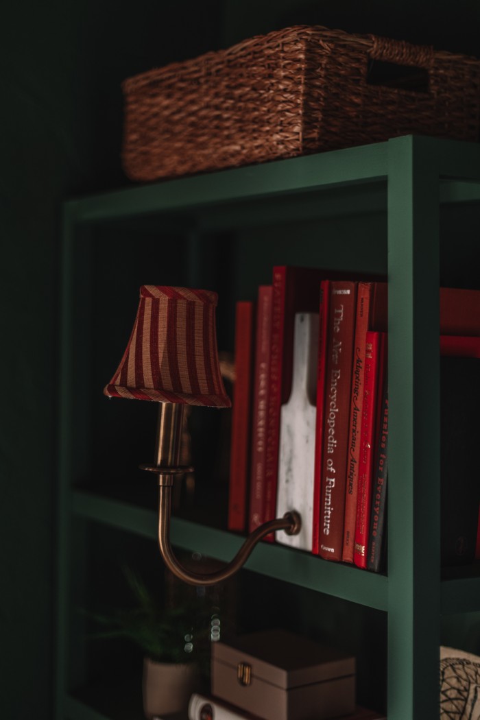 bookshelf light with red stripe shade