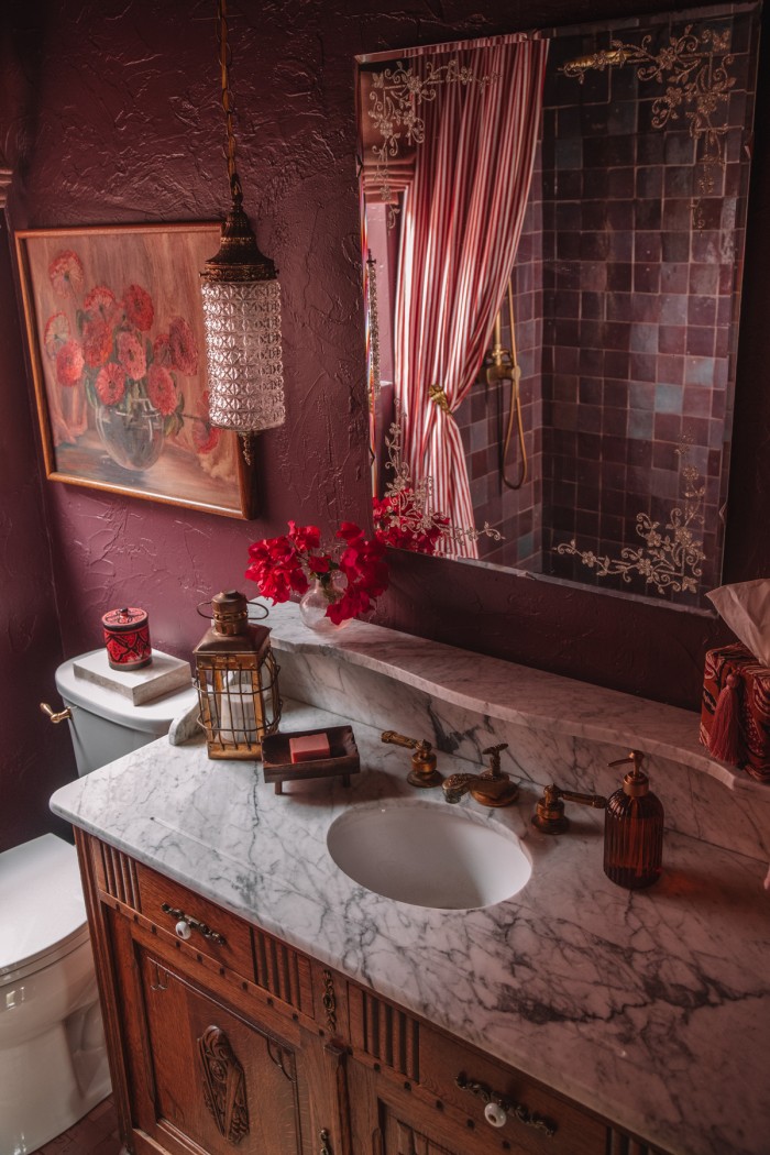 marble vanity in purple bathroom