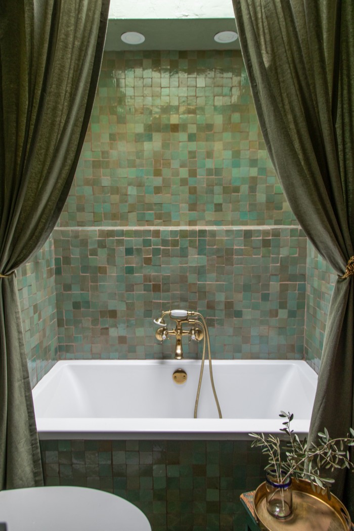 sage green shower curtains with sage green tile behind